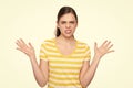 angry young girl in summer striped tshirt isolated on white background