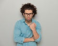 angry young man with glasses being upset and showing fist Royalty Free Stock Photo