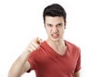 Angry young man pointing on you Royalty Free Stock Photo