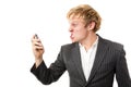 Angry young man shouting on the phone Royalty Free Stock Photo