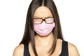 Angry young woman with a face medical mask and foggy glasses Royalty Free Stock Photo