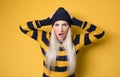 Angry young woman with hands on head and tearing hair out while looking to camera,  on white background Royalty Free Stock Photo