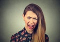 Angry young woman having nervous breakdown, screaming crying Royalty Free Stock Photo