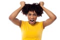 Angry young woman pulling her hair out Royalty Free Stock Photo