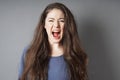 Angry young woman screaming and shouting Royalty Free Stock Photo