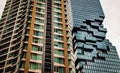 Angular geometric mirror cladding with repeating structure of modern architecture Royalty Free Stock Photo