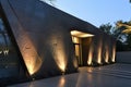 angular modern home front with spotlights on textured walls Royalty Free Stock Photo