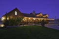 Angular view of ranch home at dusk