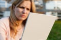 Angy woman with tablet