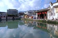 The `Moon Pond`, a crescent-shaped pond, in the center of Hongcun Village, UNESCO World Heritage Site, in Huangshan City.