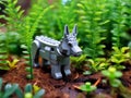 Animal characters built using plastic blocks and placed in nature.