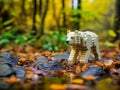 Animal characters built using plastic blocks and placed in nature.