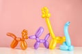 Animal figures made of modelling balloons on table