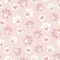 Pet paw seamless pattern.Vector illustration with paw and hearts on pink background.