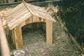 Animal home in the garden green grass, rabbit small wooden house cute for pets in backyard outdoor