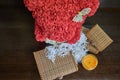 Animal made of artificial roses with chests and a candle