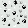 Animal paw prints. Black white seamless background