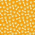 Animal seamless pattern of paw footprint and bone Royalty Free Stock Photo