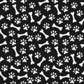 Animal seamless pattern of paw footprint and bone Royalty Free Stock Photo