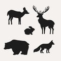 Animal silhouettes on white background. Silhouettes of deer, hare, bear and fox. Royalty Free Stock Photo