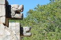 Animal statues in wall at Chichen Itza