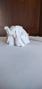 Animal towel in the shape of an elephant placed on the bed looks cute, animal towels are made for special guests in 3 star hotels Royalty Free Stock Photo