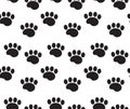 Animal tracks seamless pattern. Dog paws traces repeating texture, endless background. Vector illustration. Royalty Free Stock Photo