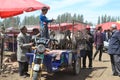 Animal traders at Uyghur Sunday Livestock bazaar market in Kashgar, Kashi, Xinjiang, China