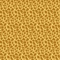 Animalistic seamless pattern giraffe skin, imitation of a giraffe pattern on yellow orange brown fabric