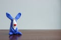 Animals blue rabbits from multi-colored plasticine, which hardens. Children`s creativity. Funny clay toys