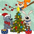 Animals decorating Christmas tree