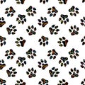 Animals footprints seamless cat and dogs pattern for wrapping paper and fabrics and linens and kids clothes print