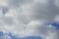 A flock of migratory wild geese flies to warmer climes in October against a cloudy sky over Berlin, Germany.