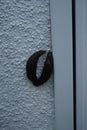 Two Limax maximus slugs are crawling on a white exterior wall in a garden. Berlin, Germany Royalty Free Stock Photo