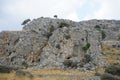 Wild Mountain Goats Climb Down Steep Rocky Mountains. Rhodes Island, Greece