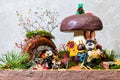 Animals and a mushroom are made of plasticine