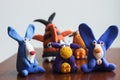 Animals rabbits, cows and fish from multi-colored plasticine, which hardens. Children`s creativity. Funny clay toys