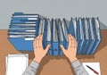 Animated scene of a desk with stacks of blue file folders. Two hands are organizing the folders, Royalty Free Stock Photo