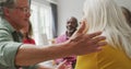 Animation of caucasia female and male seniors embracing during support group meeting