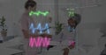 Animation of colourful cardiographs over diverse patient and doctor using tablet