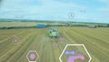 Animation of eco icons and data processing over countryside farm land