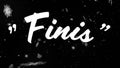 Animation of finis text over falling snow