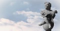 Animation of gray sculpture of cupid over blue sky and clouds, copy space