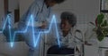 Animation of heart rate monitor over diverse female healthworker helping senior woman to walk