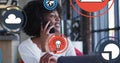 Animation of icon in circles over biracial woman laughing and talking on cellphone
