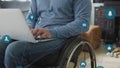 Animation of network of connections over disabled cuacasian man sitting in wheelchair