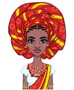 Animation portrait of a young African woman in a turban and ethnic jewelry. Royalty Free Stock Photo