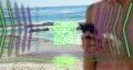 Animation of qr code, digital lines with skyscrapers over caucasian woman using phone at beach