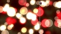 Animation of rerto microphone with santa hat over shining bokeh