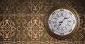 Animation of retro clock ticking showing midnight with gold patter on brown background